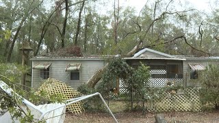 Columbia County woman still has tree on house, months after Hurricane Helene