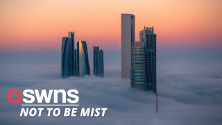 Stunning footage captures some of world's tallest buildings shrouded in thick fog | SWNS