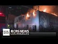 Firefighters battle downtown Los Angeles commercial building fire