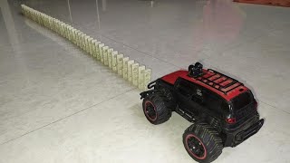 Stone Domino Blocks Falling in slow motion by SUV toy car by children