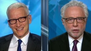 Wolf to Anderson Cooper: Quit giggling