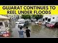 Gujarat: Cities Reel Under Heavy Downpour and Flash Floods; IMD Issues Red Warning Throughout | N18V