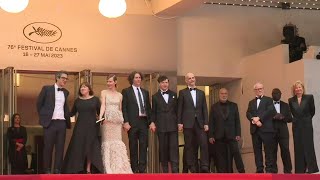 Cast and crew of "Zone of Interest" by Jonathan Glazer walk the red carpet in Cannes | AFP