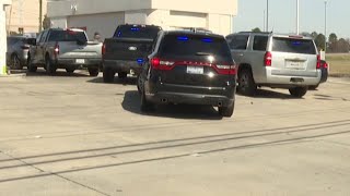 Cops converge on Augusta gas station to capture suspect