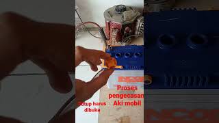 proses pengecasan aki mobil guys