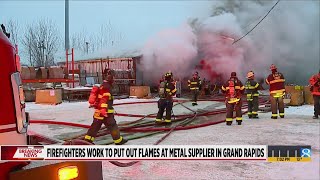 Crews work to douse fire at Grand Rapids metal supplier