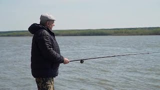 Elderly Fisherman Angling Stock Video