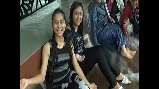 Rajkot youths celebrate rains at  Race course