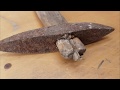 Old rusty construction hammer restoration.