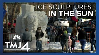 Crowds admire ice sculptures in Lake Geneva amid unseasonably warm temperatures