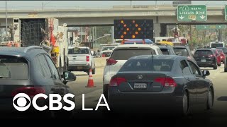 Roads near LAX closed as crews patch natural gas leak, water main break