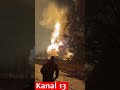 the moment a huge oil base catches fire after being struck in russia people are fleeing