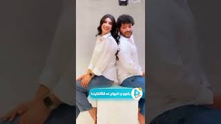  بانوو و کاروان دوو هاوسەری جوان لە ڕۆژی ڤاڵانتایندا لە کاتی چرکاندنی چەند وێنەیەکی یادگاری