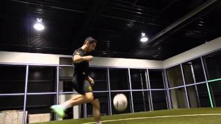 Henrik Mkhitaryan using a Footbonaut Machine.