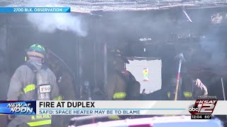 Fire heavily damages duplex on far West Side