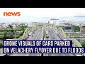 Drone visuals of cars parked on Velachery flyover due to floods in Chennai, Tamil Nadu