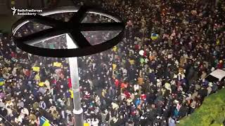 Vast crowds protest the Russian invasion and sing Ukraine's national anthem in Tiblisi, Georgia.