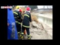 Firemen Rescue Girl Stuck In Mud