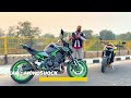 triumph street triple 765 rs takes on kawasaki z900