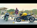 triumph street triple 765 rs takes on kawasaki z900