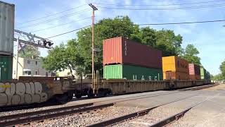 NS 8083 ES44AC leads NS 25V with a friendly crew at Piscataway,NJ