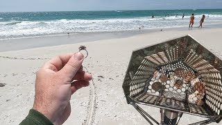 I found my BIGGEST diamond ring ever metal detecting at the beach!