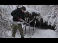 Survival in a cold wild forest. Constructing shelter to protect yourself from snow and wind . ASMR
