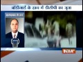 gujarat police gunman carries his boss s shoes india tv