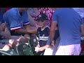 nyy@tex jeter flips a ball to a young yankees fan