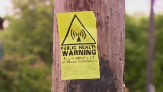 5G cell tower critics post 'health warning' signs