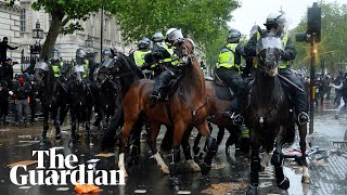 Mounted police charge into protesters at London anti-racism demonstration