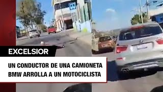 Conductor arrolla a motociclista y lo arrastra por varios metros en Querétaro