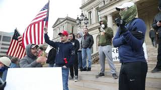 Protesters argue with a passerby during 'Operation Gridlock'