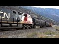 cp heritage sd70acu with kcs sd70ace up unit and cn action in the thompson canyon