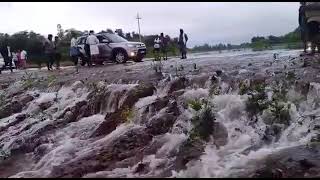 vani vilasa sagar dam today water over flow on road , vv sagar dam , hiriyur dam , marikanive dam