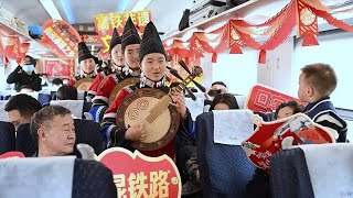 GLOBALink | Rail in SW China transforms into cultural showcase for Spring Festival travelers