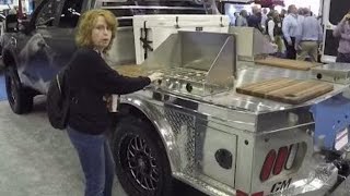 Organize your truck!  The Work Truck Show CM Truck Beds; Cargo Slide; OnSpot Automatic Tire Chains
