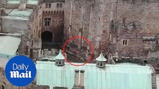 Drone footage captures ghostly knight galloping through castle - Daily Mail