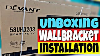 Unboxing and installing wallbracket Devant 58 inches smart tv DEVANT 55UHD203