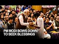 PM Modi bows down to seek blessings of Padma Shri awardee Kota S Sastry