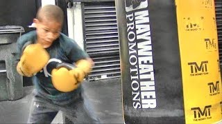 14x Nation Champ Curmel Moton working the heavy bag inside the Mayweather Boxing Club