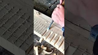 The process of manually cutting grooves with a chisel