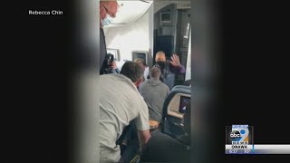 Man attempts to break into cockpit