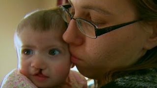 Surrogate mom defies family, has baby