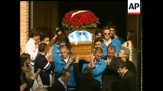 Bells tolled in hilltowns across central Italy on Wednesday as the first funerals got under way for