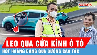 Thót tim: Khoảnh khắc người đàn ông leo qua cửa kính ô tô băng qua đường cao tốc | Thời sự