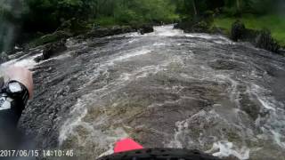 Canoeing down the river Lyon Perthshire