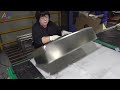 process of mass producing kitchen sinks by automated robots. amazing stainless sink factory