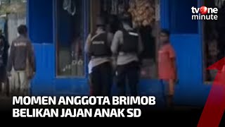 Momen Saat Anggota Brimob Belikan Jajan Anak SD Sebelum Berangkat Sekolah | tvOne Minute