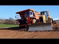 CAT D6 dozer at work on a road construction site (part 1)